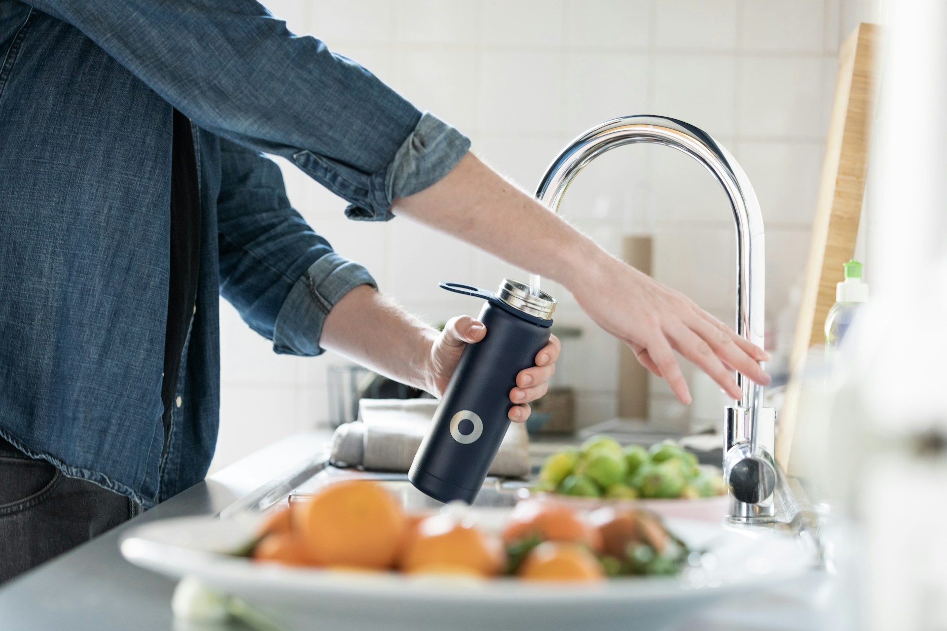 getting water from faucet